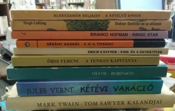 Hugh Lofting, Branko Hofman, D�k�ny Andr�s, Erich K�stner, �rsi Ferenc, Defoe, Jules Verne, Mark Twain Alekszandr Beljajev - 9 db-os K�NYVMENT� AJ�NLAT, ifj�s�gi: A k�t�lt� ember+ Doktor Dolittle �s az �llatok+ Ringo Star+ S.O.S. Titanic!+ Emil �s a detekt�vek+ A Tenkes kapit�nya+ Robinson+ K�t�vi vak�ci�+ Tom Sawyer kalandjai