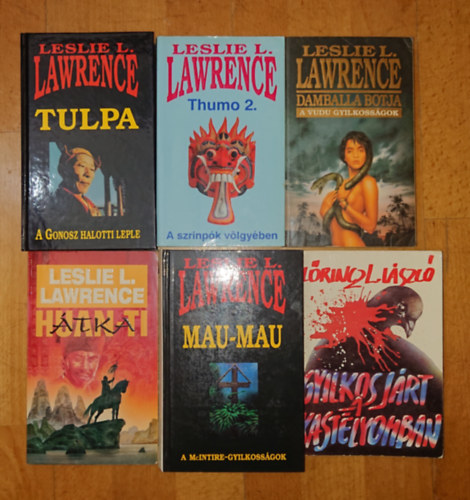 Lőrinc L. László , Leslie L. Lawrence Lőrinc L. László (Leslie L. Lawrence) - 6 könyv Leslie L. Lawrence-től: Huan-Ti átka, Mau-Mau, Tulpa, Thumo 2., Damballa botja, Gyilkos járt a kastélyomban
