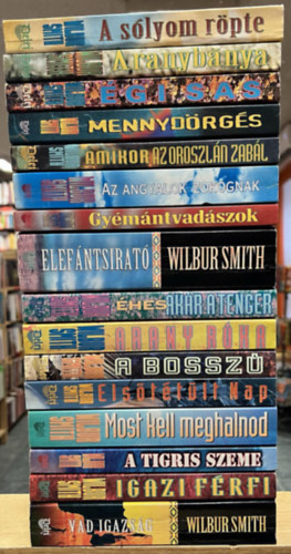 Wilbur Smith - 16 db Wilbur Smith ktet: A slyom rpte, Aranybnya, gi sas, Mennydrgs, Amikor az oroszln zabl, Az angyalok zokognak, Gymntvadszok, Elefntsirat, hes akr a tenger, Arany rka, A bossz, Elsttlt nap, Most kell megha