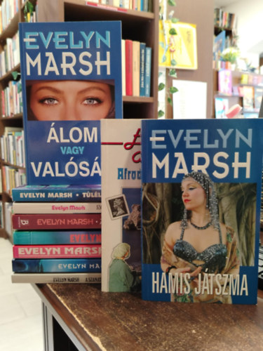 Evelyn Marsh - K�NYVMENT� AJ�NLAT, 10 DB. Evelyn Marsh. Afrodit� sikolya+ Hamis j�tszma+ �lom vafy val�s�g+ T�l�l�s+ R�m�let a katedr�lisban+ A gy�gy�t� Buddha+ A r�m+ Retteg�s+ A csapda+ A szanat�rium rejt�lye
